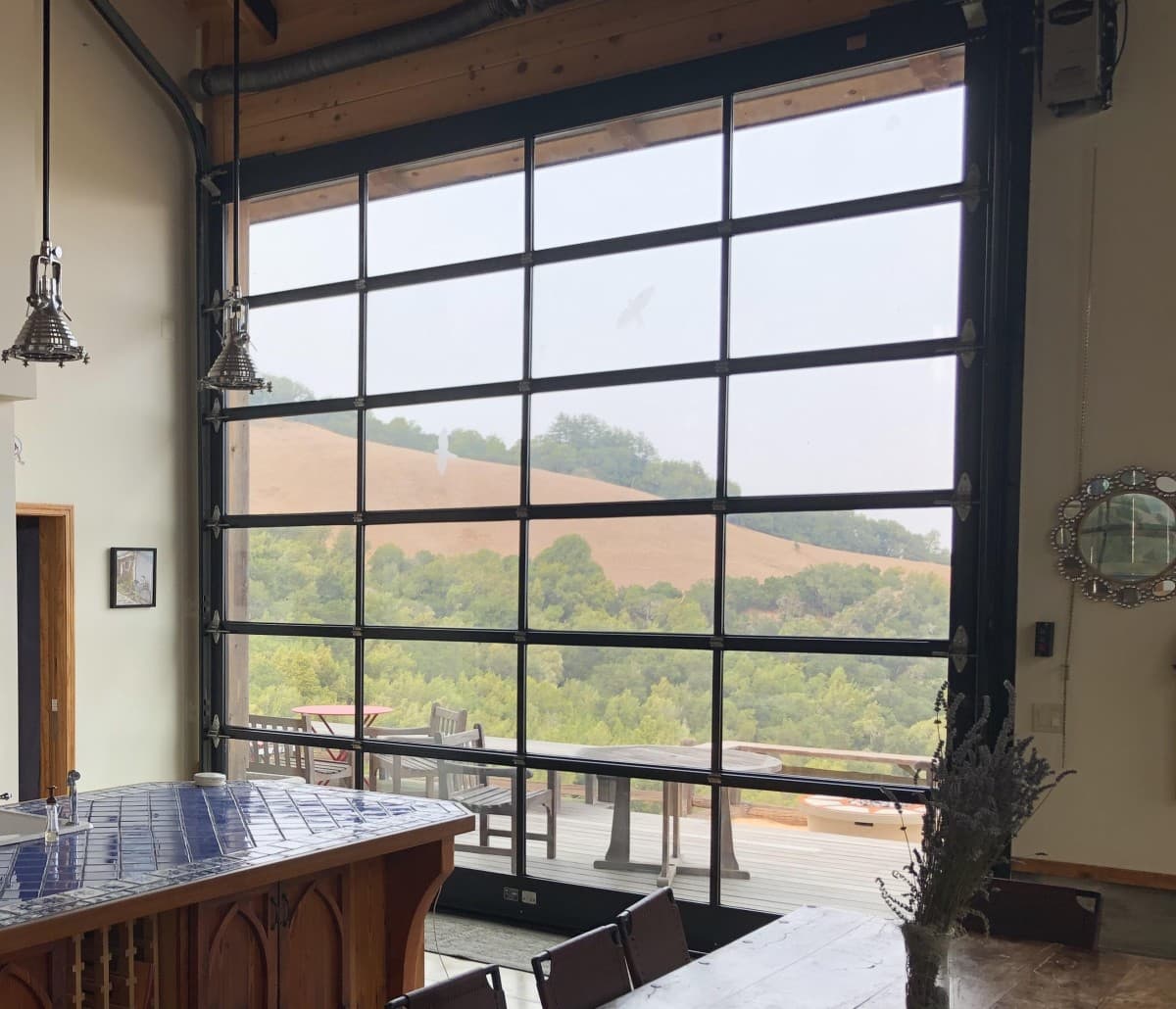 bp Overhead Glass Garage Doors Eliminate Floor Tracks and Pinch Points in Luxury Design