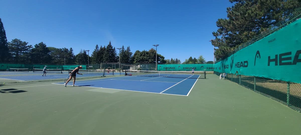 Hillcrest Tennis Camp Guide Highlights Differences Between Specialized Tennis Instruction and General Day Camps
